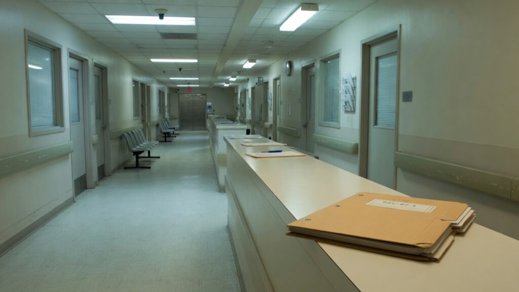 Closed records folder on a counter in an empty administrative corridor