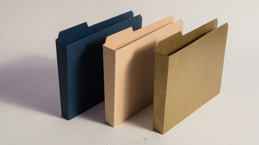 Collect, Place, or Sell: Three Paths for a Charge-Off 1 Three blank folders standing in a row, suggesting collect, place, or sell